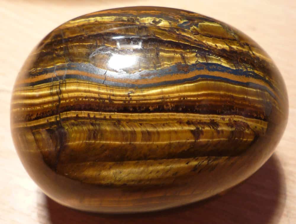 Tiger's Eye egg shaped crystal for attracting power and money